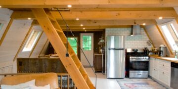white couch beside brown wooden table
