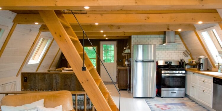 white couch beside brown wooden table