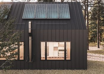a wood building with a glass roof