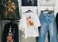 a display of t - shirts and jeans in a store
