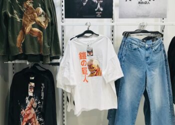 a display of t - shirts and jeans in a store