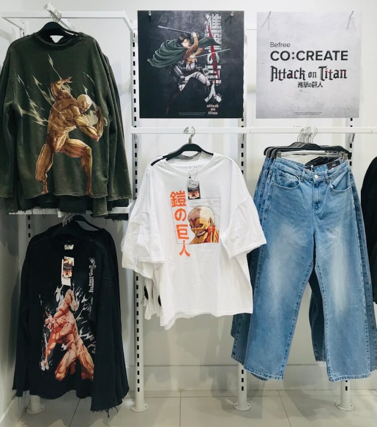 a display of t - shirts and jeans in a store