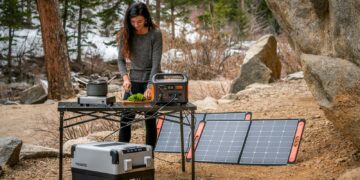 a person standing next to a music instrument