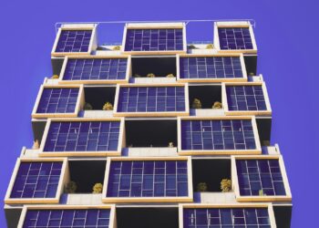 A very tall building with lots of windows